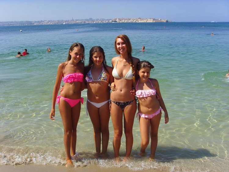 at the beach with host sisters