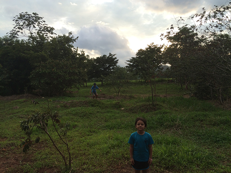 Me and my host siblings exploring the horse pastures at the end of our street.