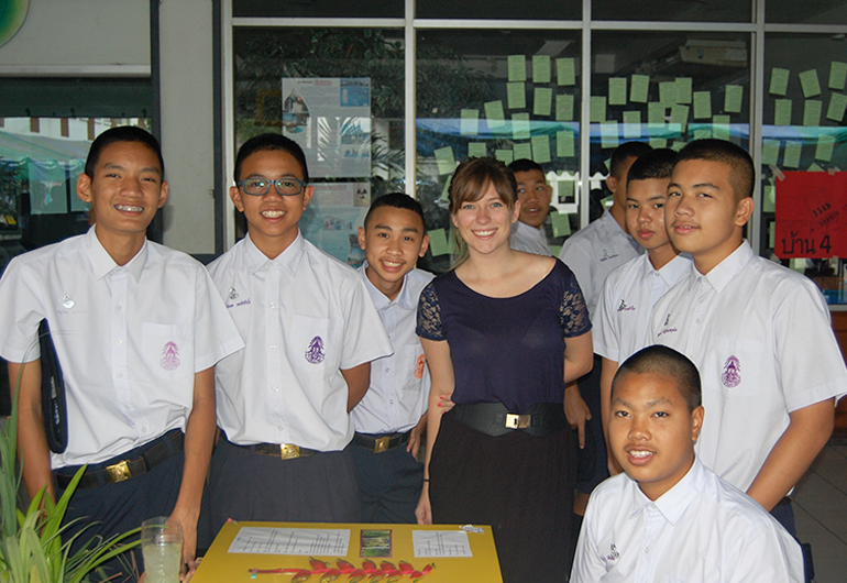 A foreign English teacher with students in Thailand.