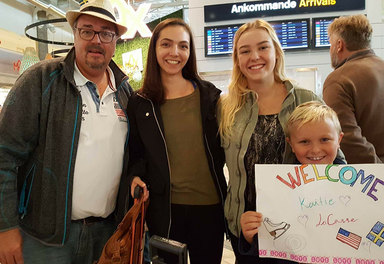 A Greenheart Traveler getting picked up at the airport by her host family.